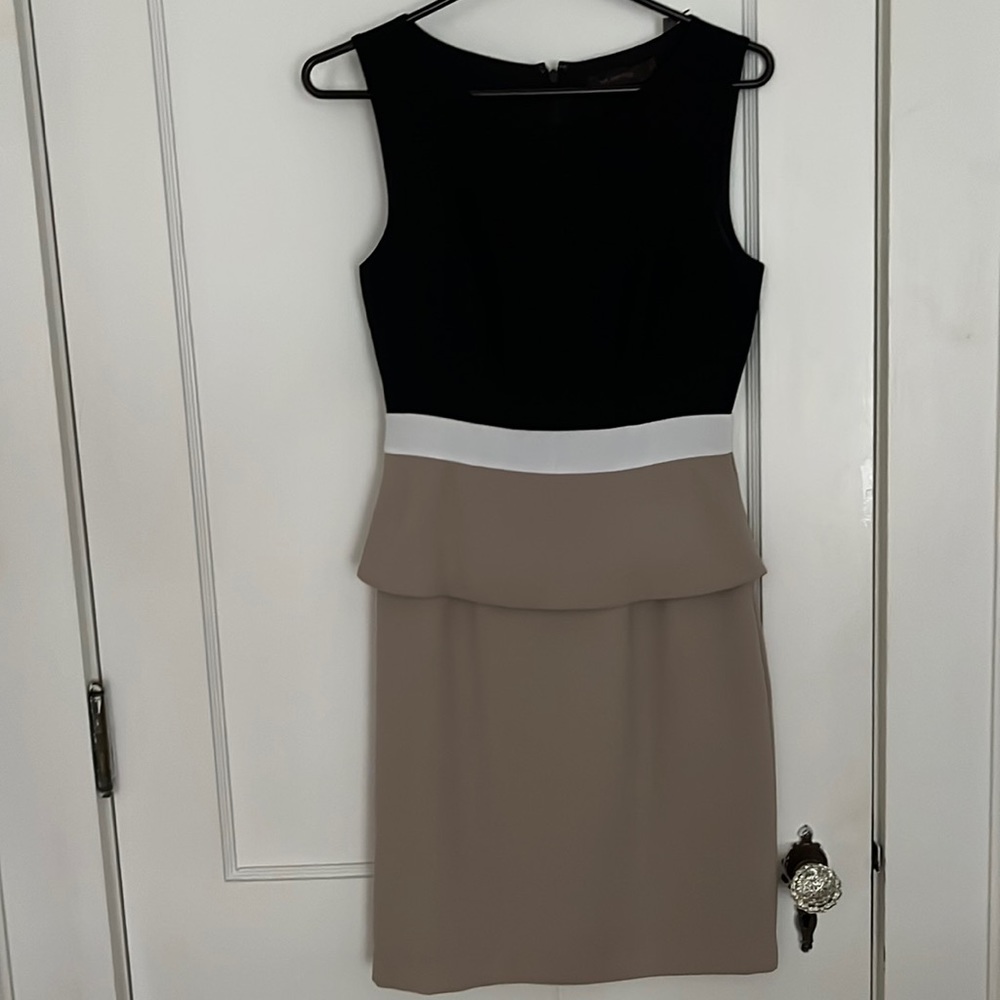 Navy and tan/beige semi formal dress. Zips in back.